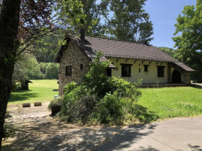 Ardennes villa with riverside garden and views